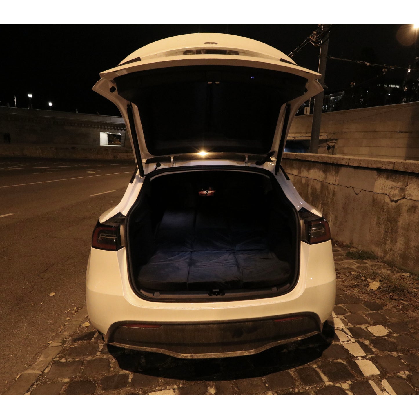 EV-MATS Tesla Model 3 + Highland mattress and carrying bag is a premium memory foam mattress, perfectly fits the dimensions of the Tesla Model 3, provides perfect comfort for sleeping, can be stored in the trunk
